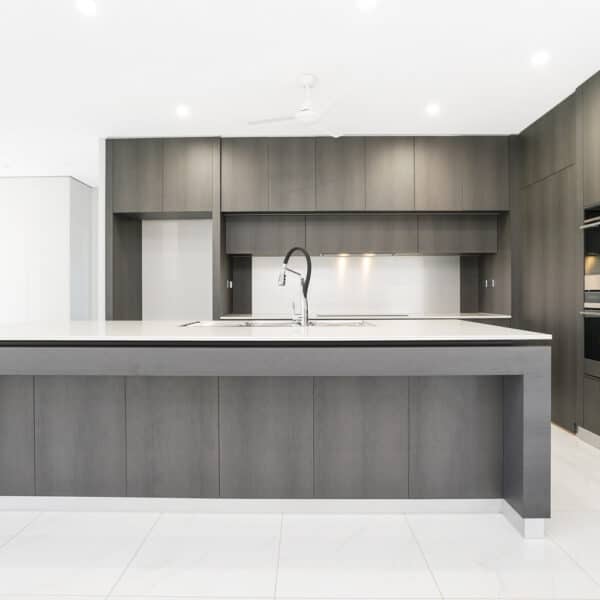 White & Grey Kitchen With Breakfast Bar — Cabinets inspiration in Coconut Grove, NT
